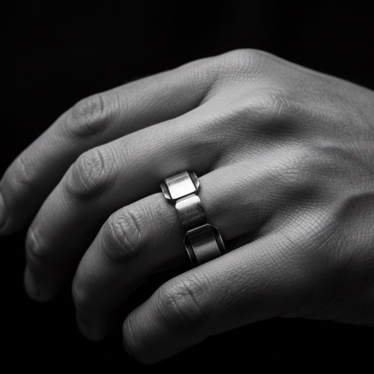 Geometric sterling silver statement ring worn on hand, bold architectural design with polished and darkened recesses — Tg-Jewellery