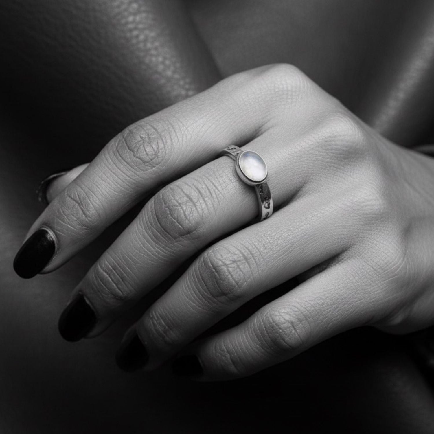 Model wearing cat's eye moonstone ring in recycled 925 silver – TG-Jewellery