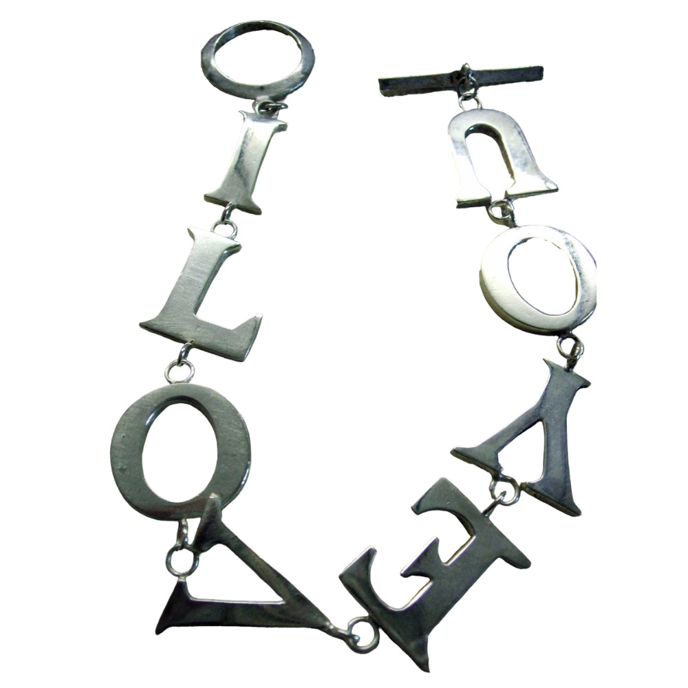 Handmade from lost wax carving and cast in sterling silver I love you