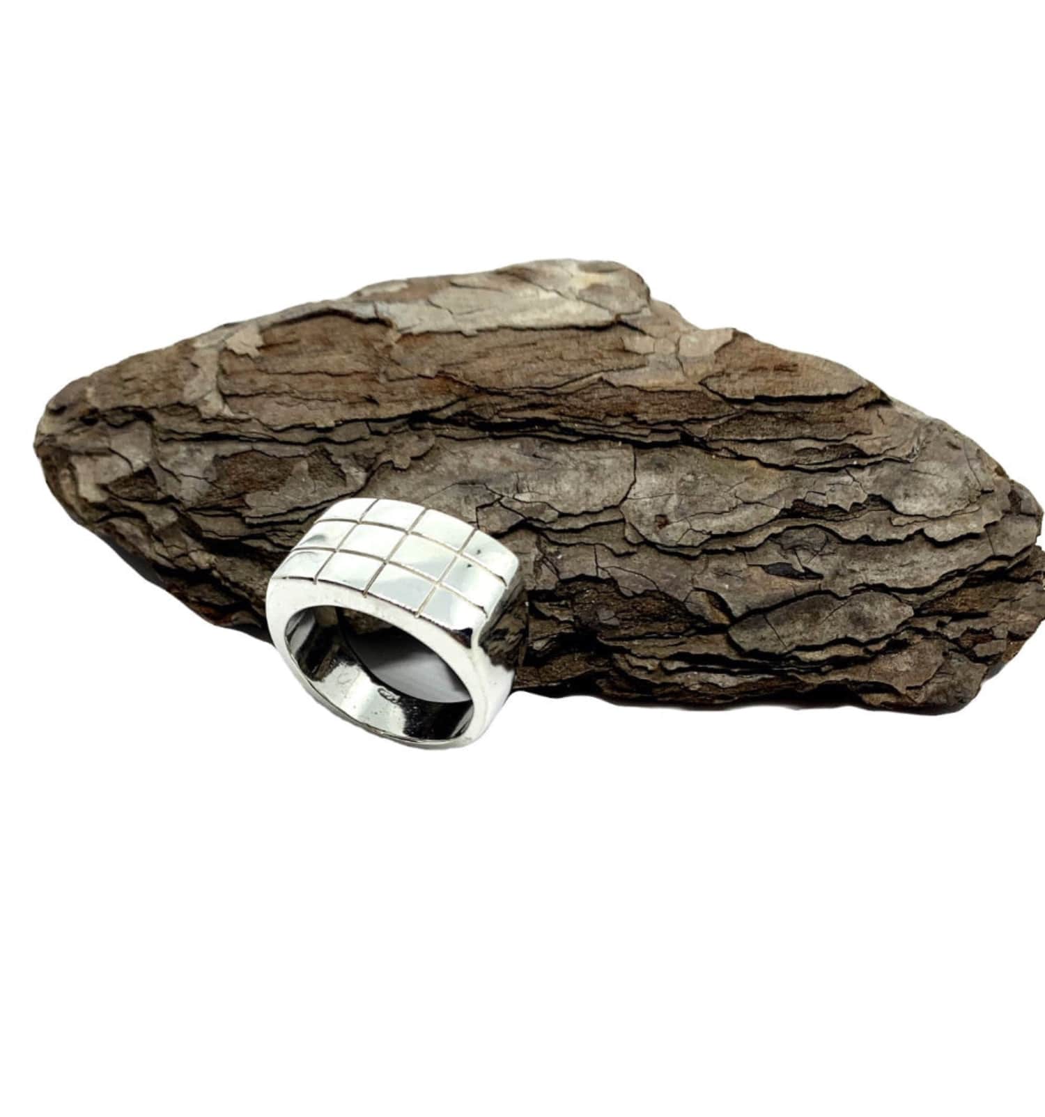 Silver ring for men with a textured band