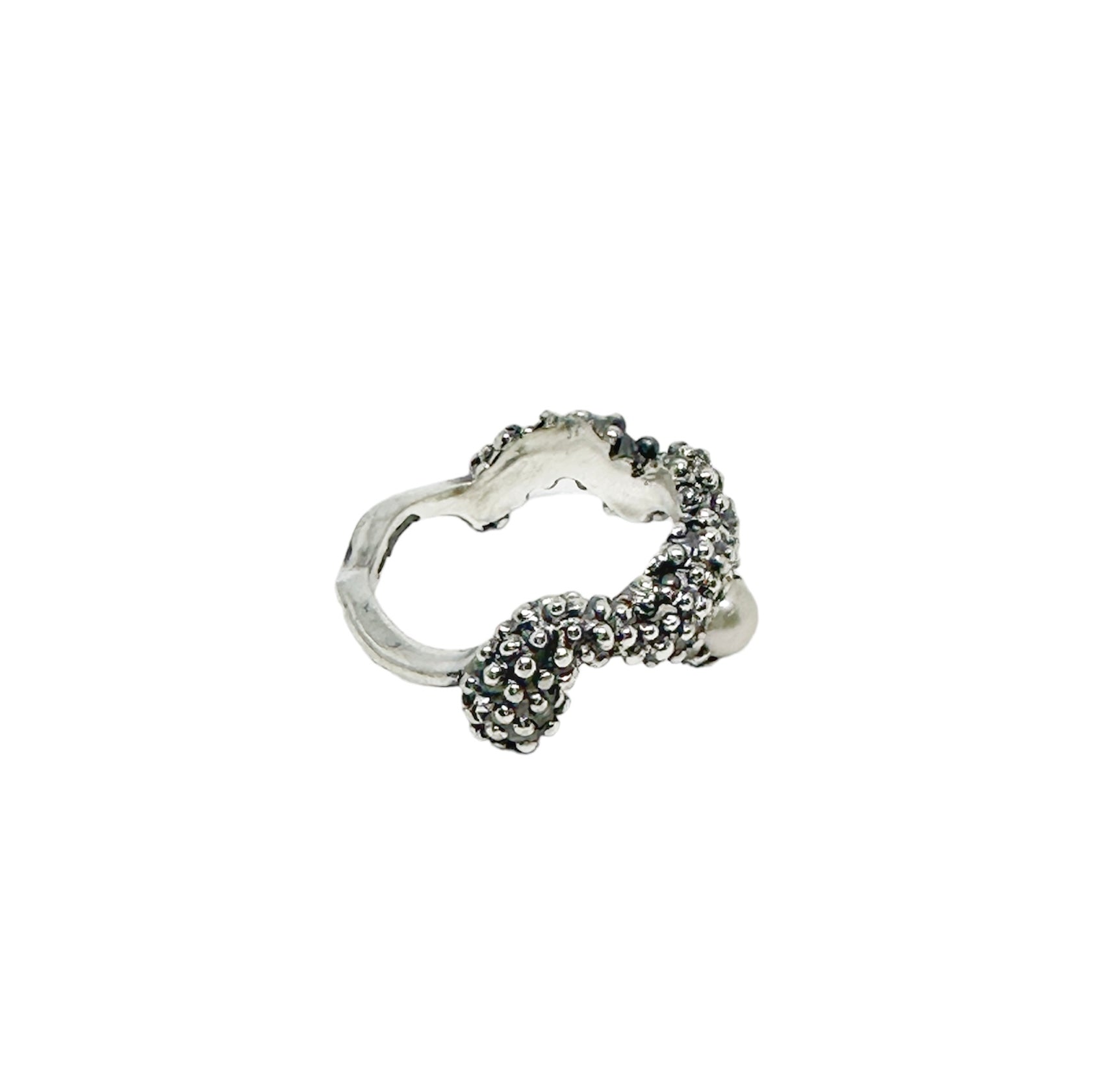 Silver ring with textured design with pearl handmade from lost wax carving and casted in sterling silver