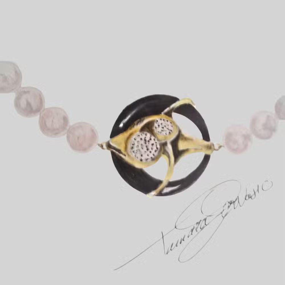 Sketch necklace featuring a circular black onyx and gold centerpiece with diamonds, connected to a strand of pearls Tg-jewellery collections