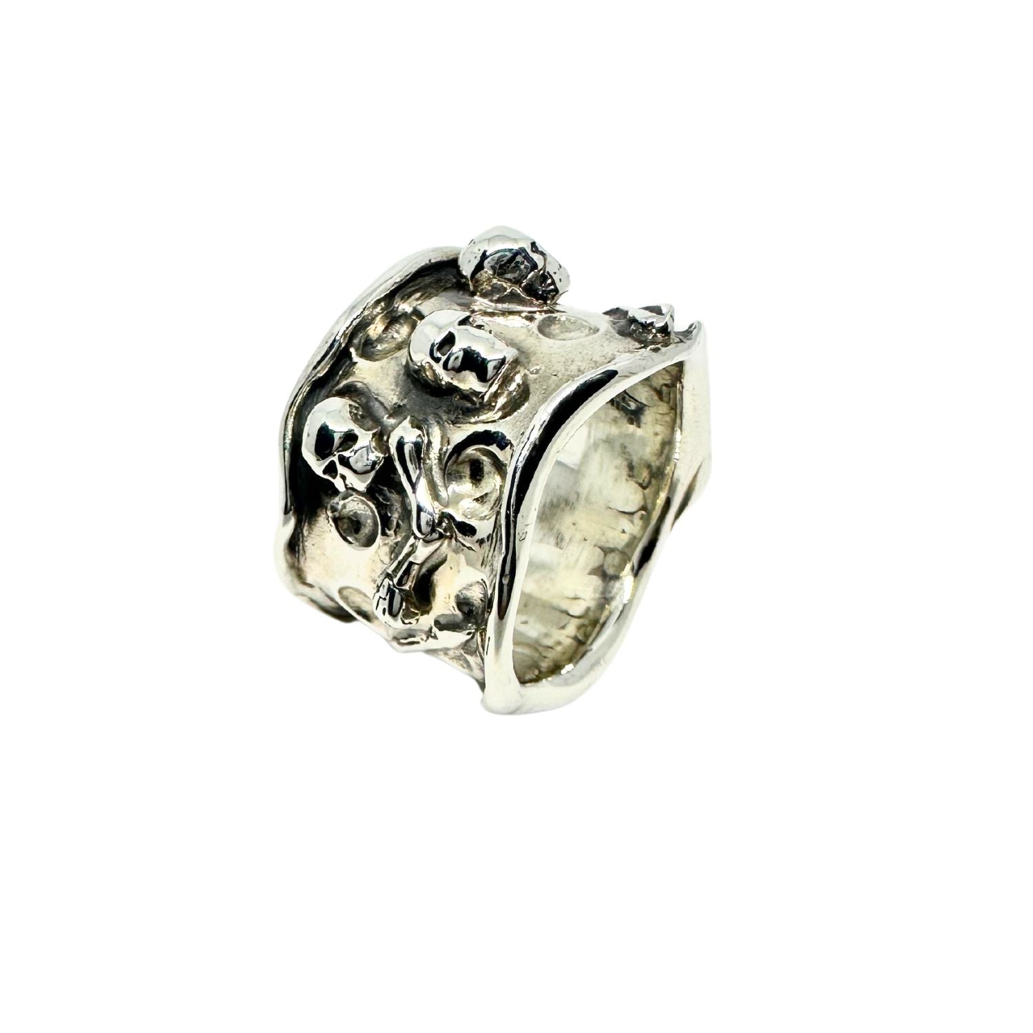 Side view of sterling silver 925 skull face ring – 19.16mm wide, hand carved lost wax, inspired by H.R. Giger, handcrafted in Cornwall by Tg-Jewellery