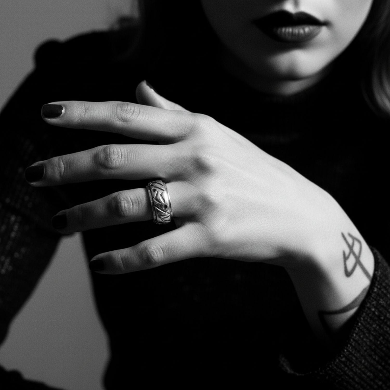 Model hand wearing sterling silver 925 abstract chunky ring with sapphire gemstones, bold sculptural presence