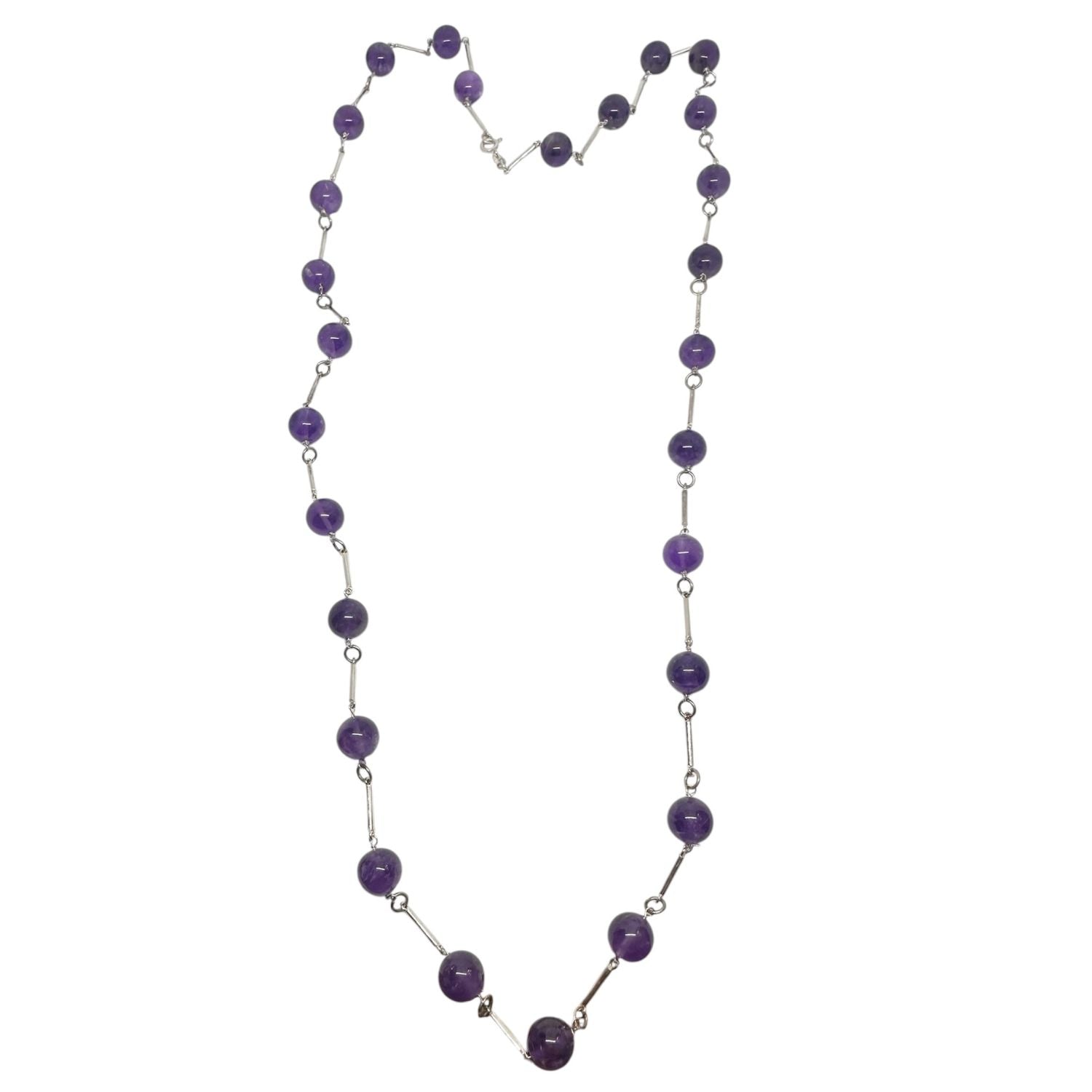 Close-up of amethyst bead necklace — natural stone variations, sterling silver 925 components, handcrafted in Cornwall