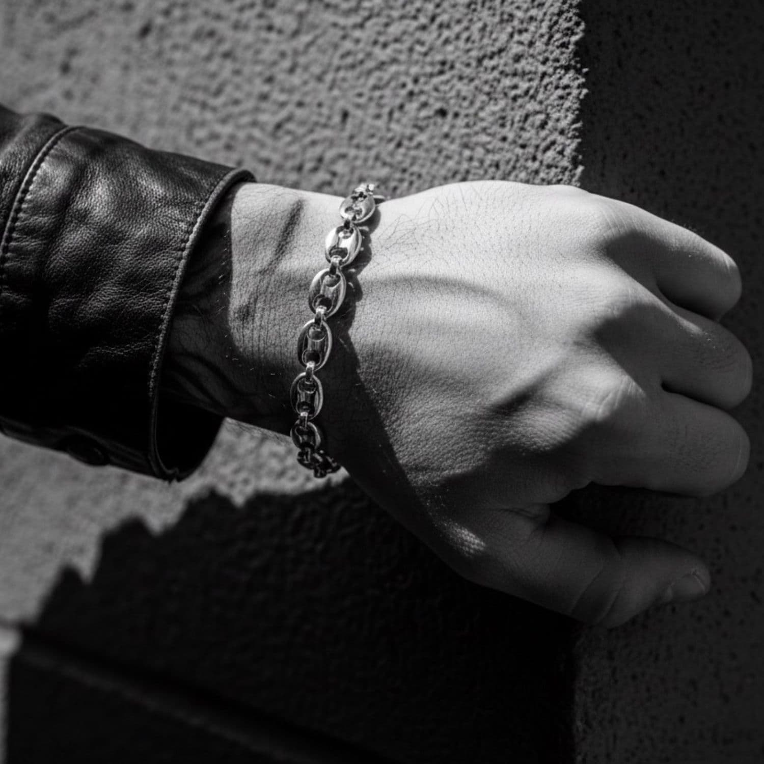 Model wearing sterling silver 925 Anchor Link Unisex Bracelet, showing polished anchor link chain and clean architectural presence on wrist – TG-Jewellery