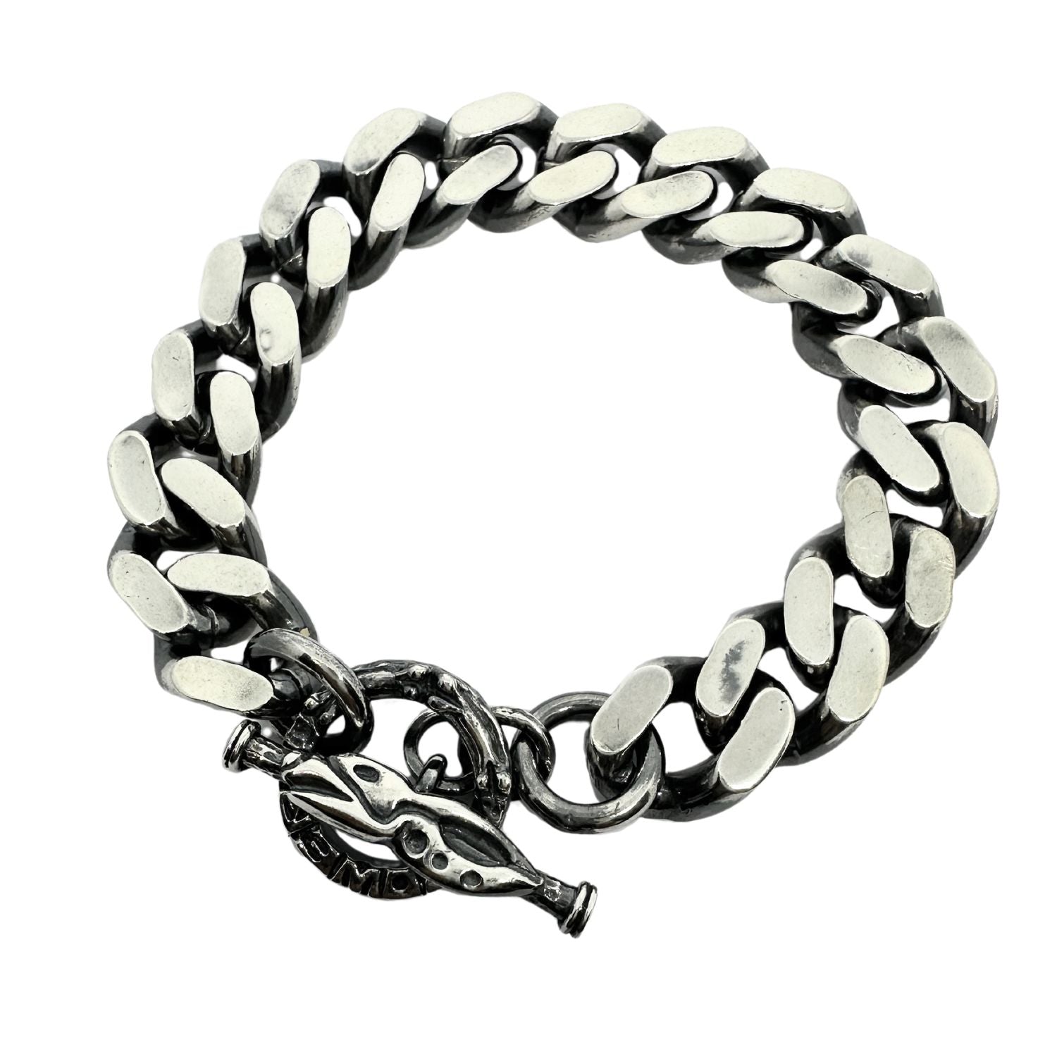 Close-up of Celtic dog motif on jump ring clasp, oxidised and polished silver - Tg-Jewellery By Tamara Gervasio