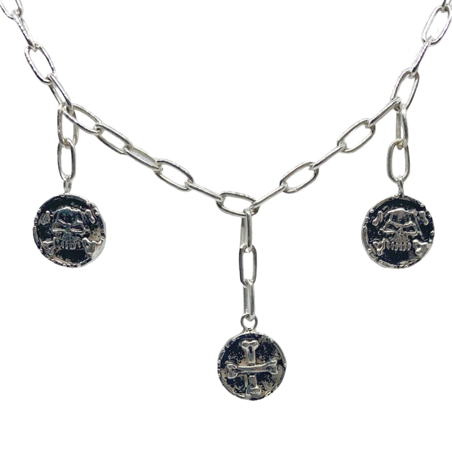 Close-up of lost wax carved skull medallion on sterling silver 925 necklace – Tg-Jewellery by Tamara Gervasio