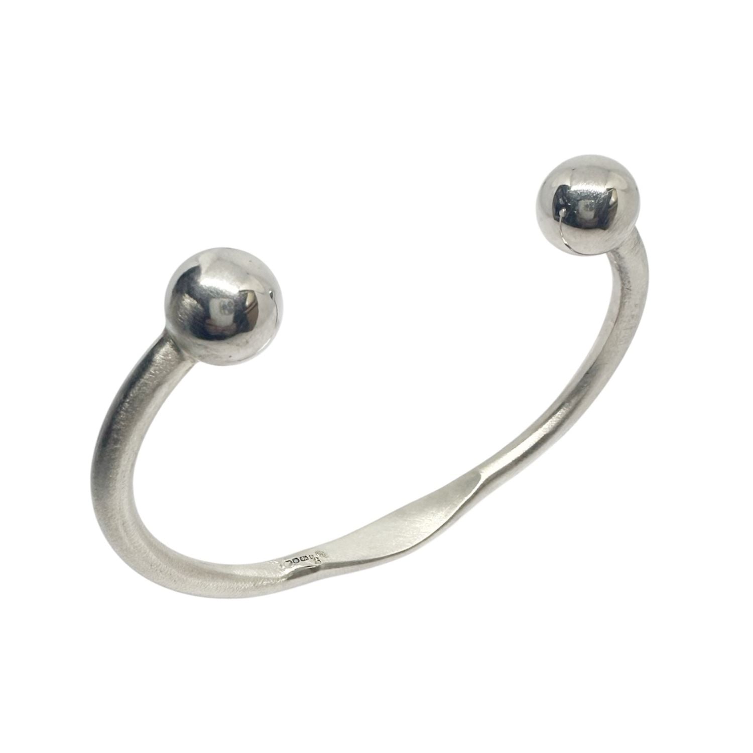 Close-up of men's silver cuff bangle – recycled sterling silver, open cuff, UK hallmarked