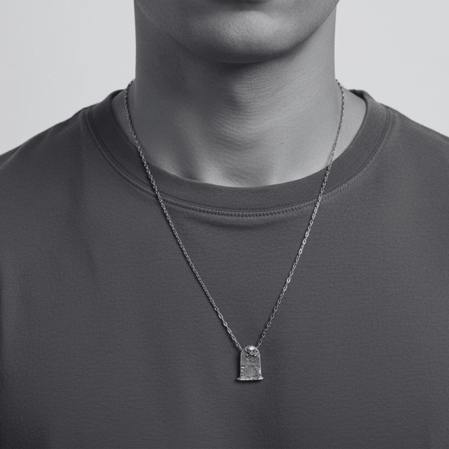 Model wearing men's skeleton grave silver necklace, gothic jewellery by Tamara Gervasio