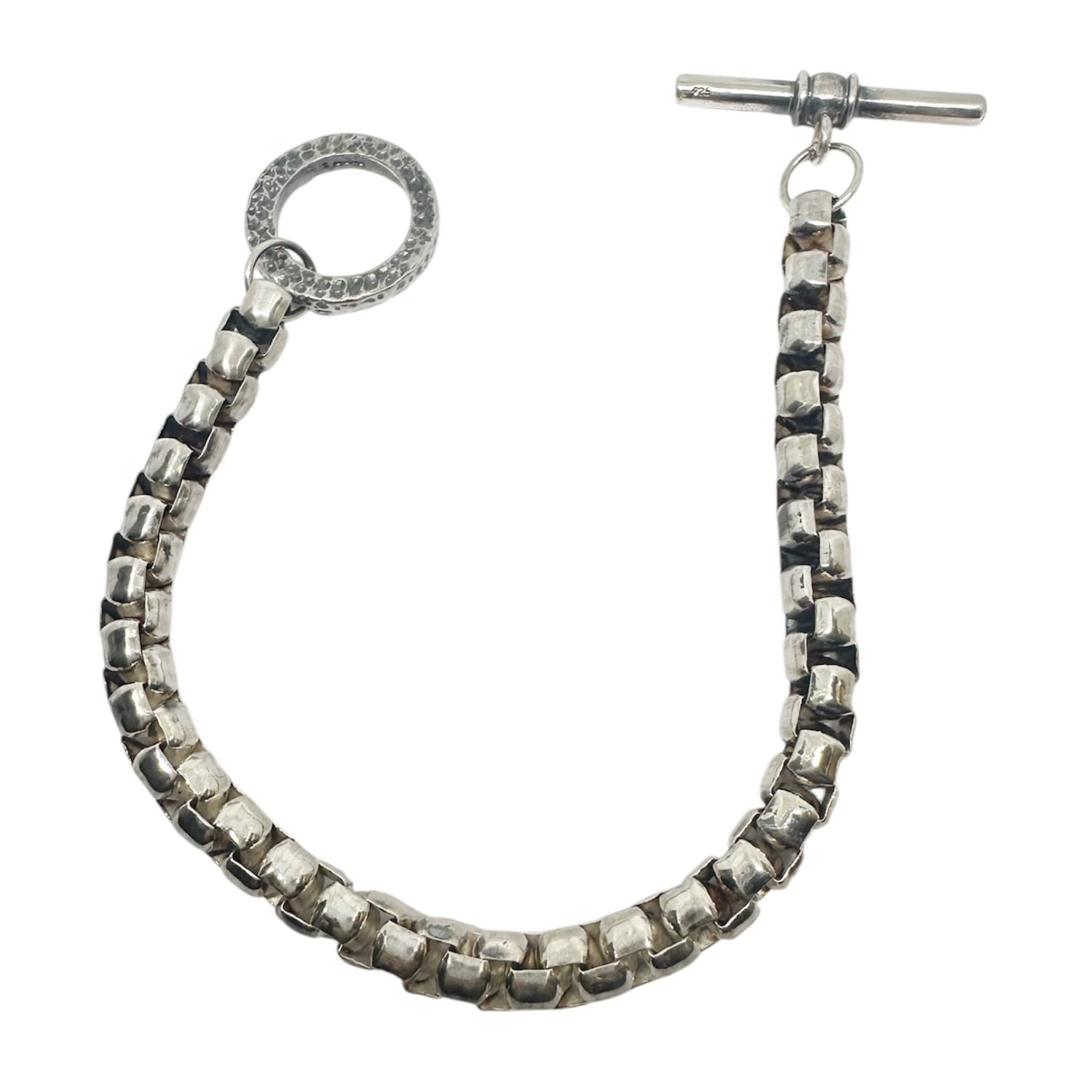 Close-up of solid silver box chain bracelet links – polished and oxide 925 sterling silver