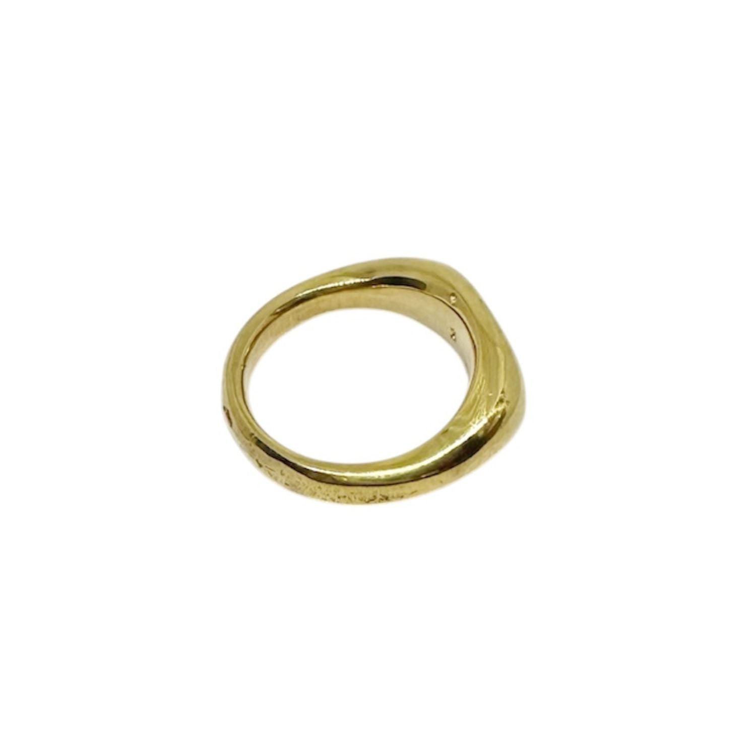 Close-up detail of Molten Flow ring, sand-cast recycled sterling silver with warm 18ct gold flash plating
