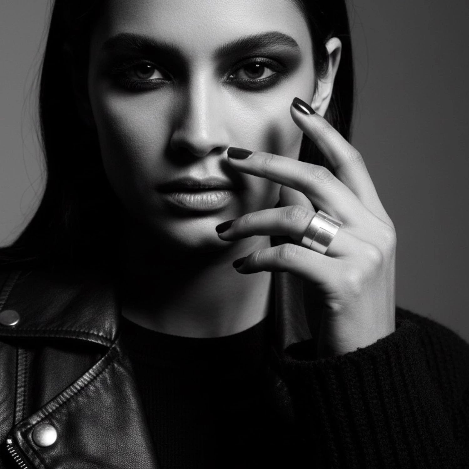 Puzzle ring worn by woman — single sterling silver 925 band showing slim profile and stackable versatility