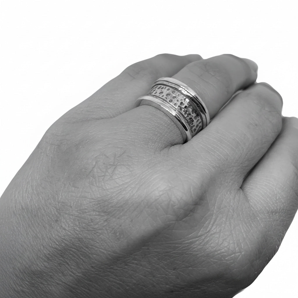 Woman wearing sterling silver 925 Street Ring Band, showing versatile unisex styling and scale