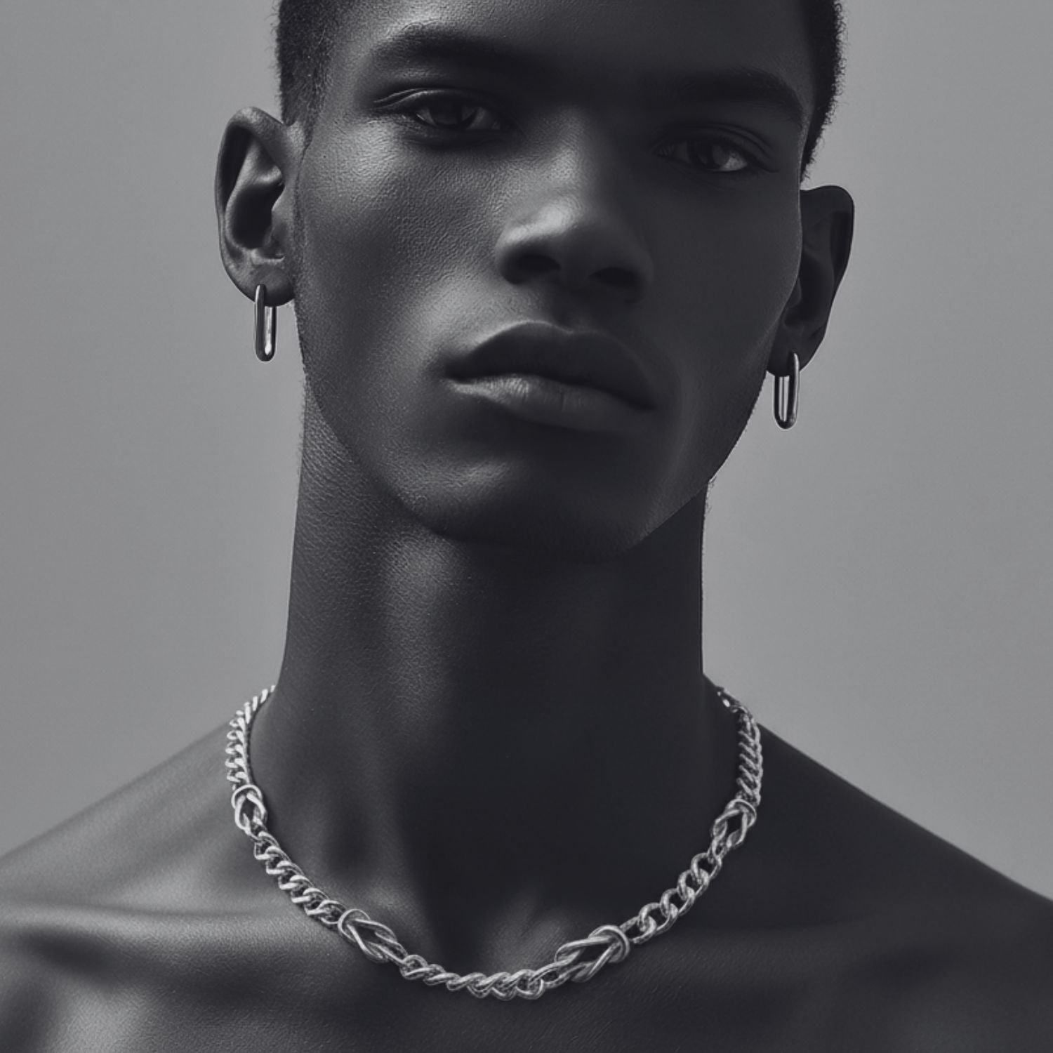 Men's sterling silver nautical knot necklace worn, showing Albert swivel clasp and oxidised curb chain, Tg-Jewellery Cornwall