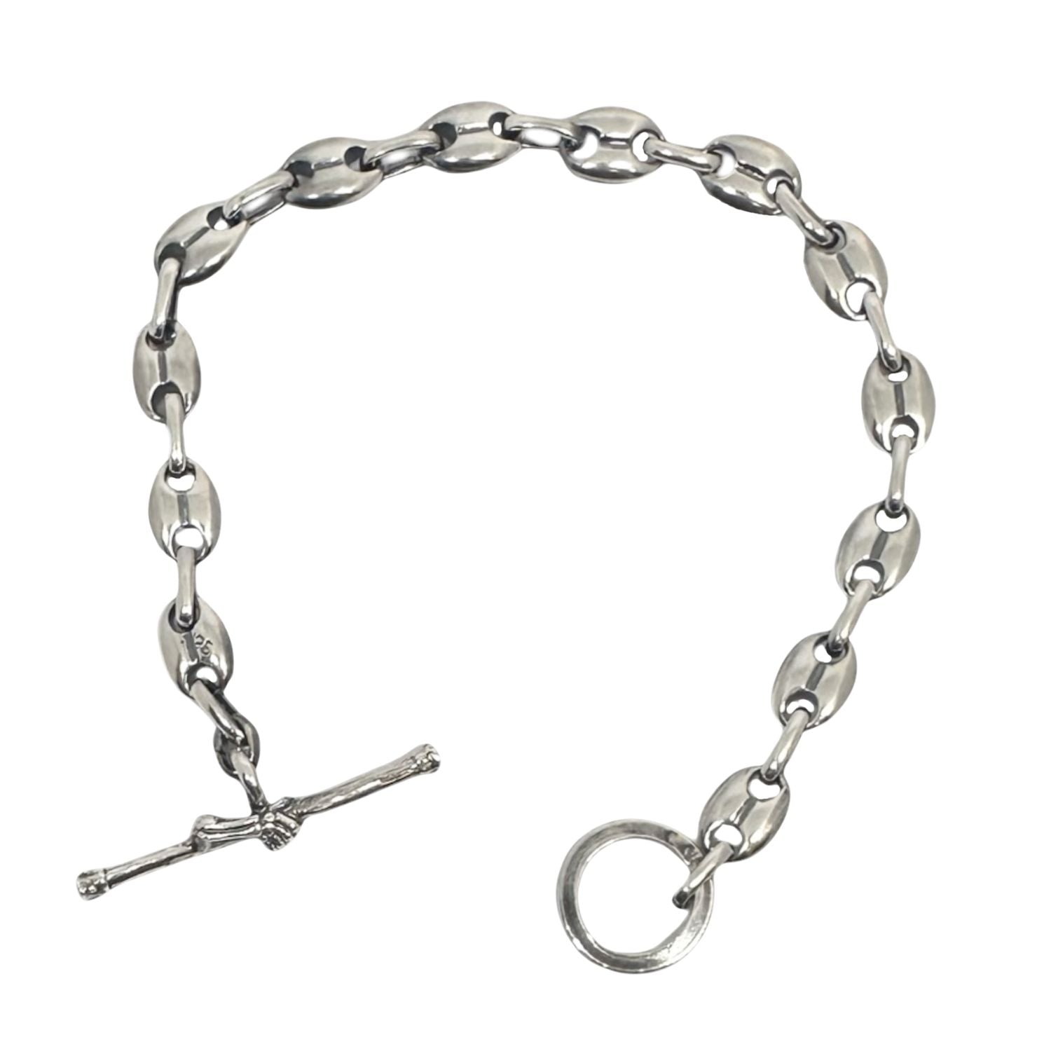 Flat lay of handmade sterling silver 925 anchor link bracelet with skull hand T-bar clasp – Tg-Jewellery by Tamara Gervasio, Cornwall