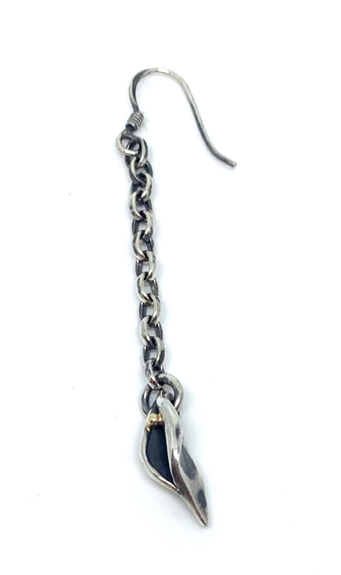 Close-up of Erotika solo earring — elongated sculptural silver form with 9ct gold accent, female silhouette - Tg-Jewellery By Tamara Gervasio