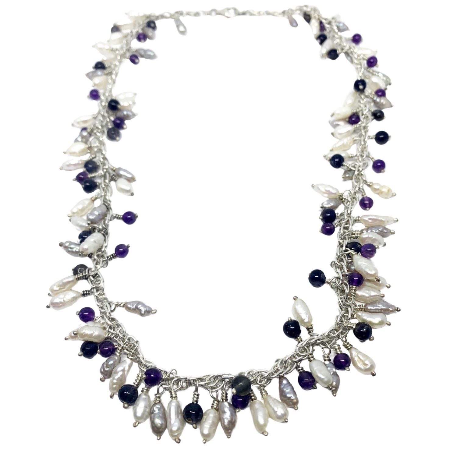 Close-up of Grappolo necklace showing freshwater pearls, amethyst and iolite on sterling silver 925 - Tg-Jewellery By Tamara Gervasio