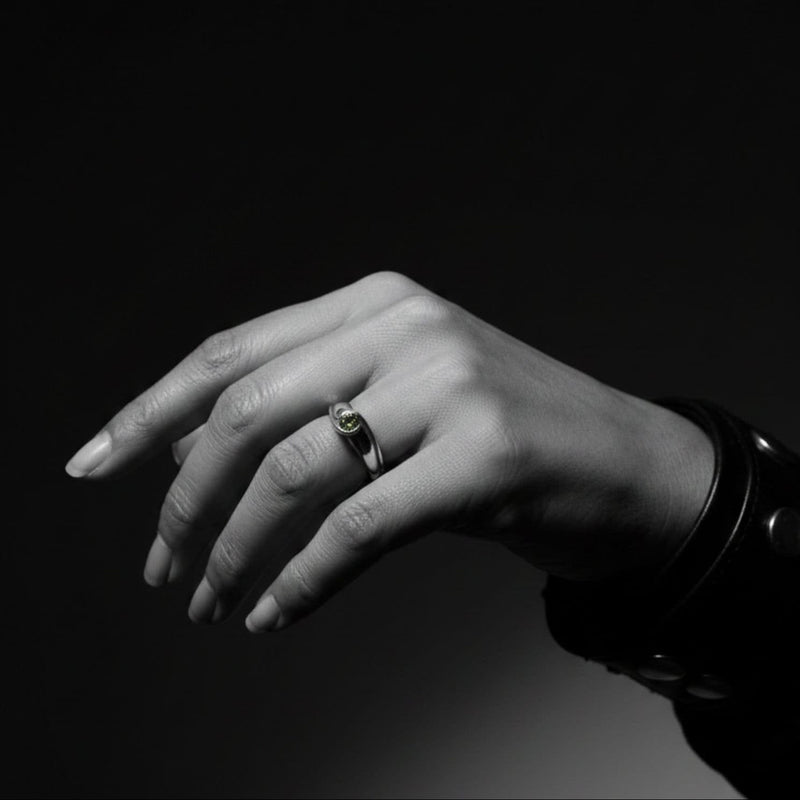 Fish Ring with green tourmaline worn on hand — sterling silver 925, showing scale and organic sculptural form - Tg-Jewellery By Tamara Gervasio