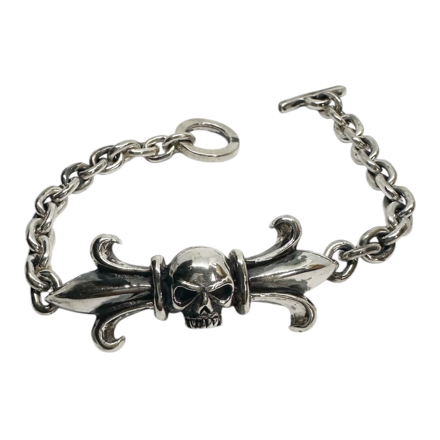 Reign and Ruin Skull Crest Bracelet in Sterling Silver 925 — Front View — Fleur-de-Lis Wings — Polished and Oxidised Finish — One of a Kind — Handmade by Tamara Gervasio"