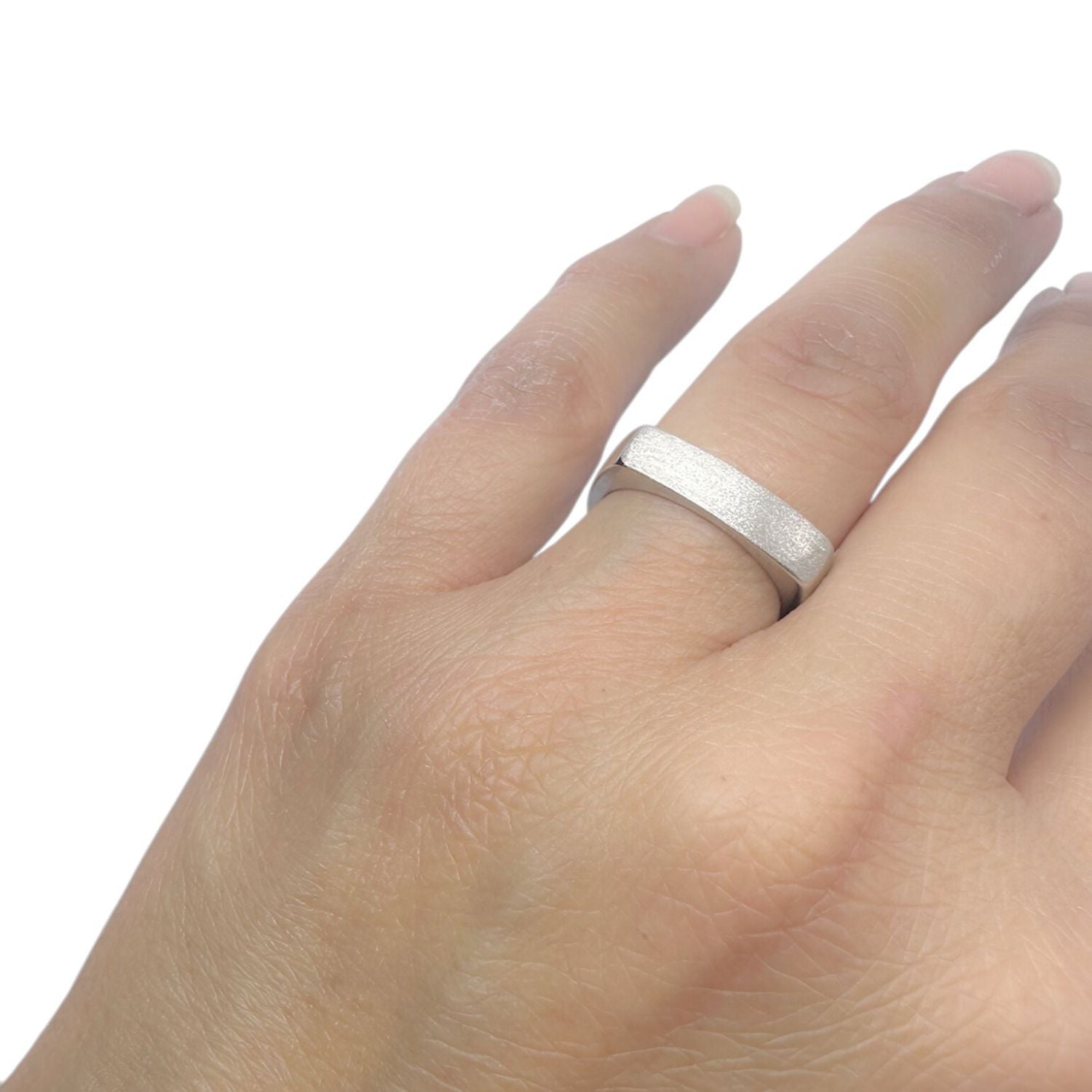 Square platinum wedding band by Tamara Gervasio