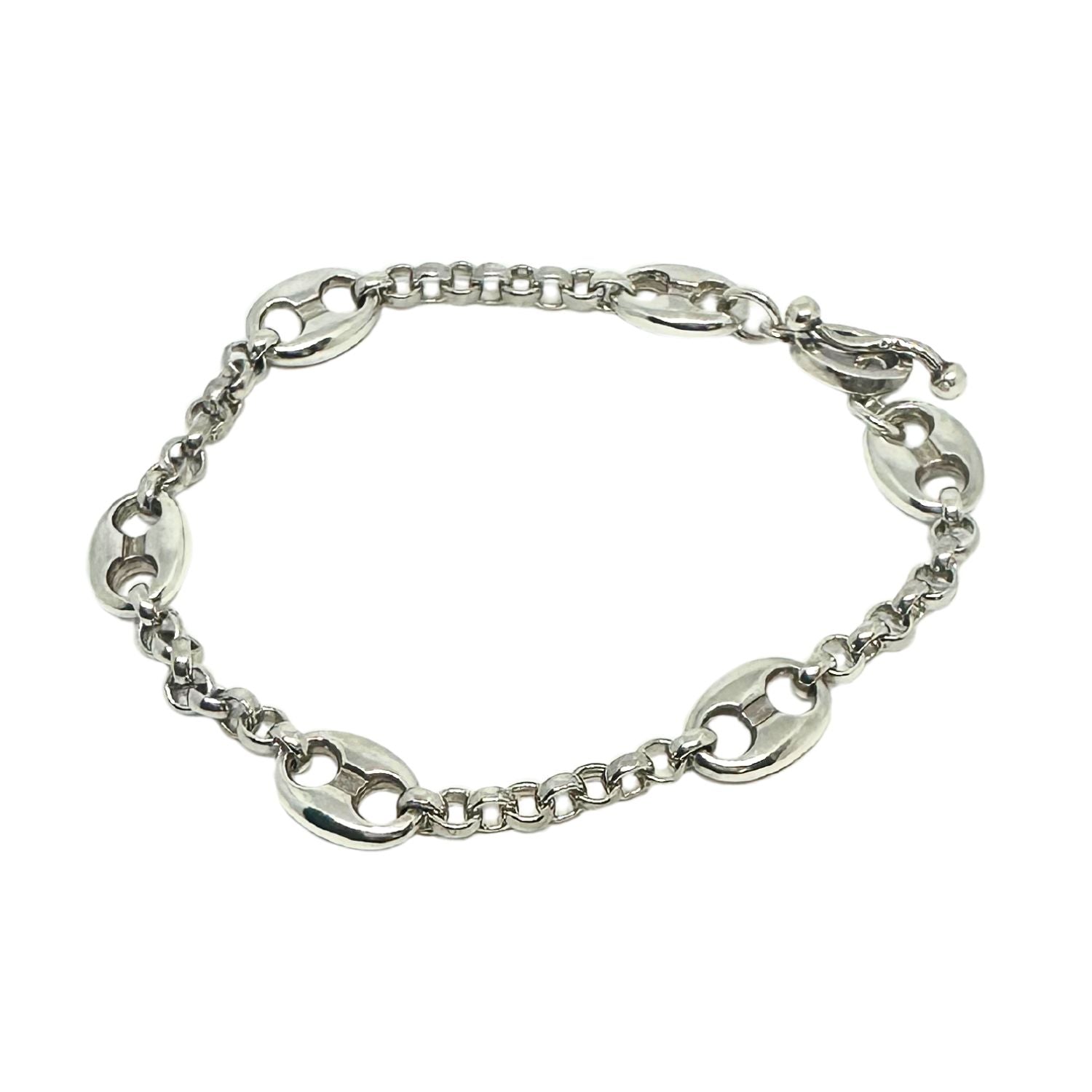 Close-up showing hand-carved anchor links and jump ring detai l- Tg-Jewellery By Tamara Gervasio