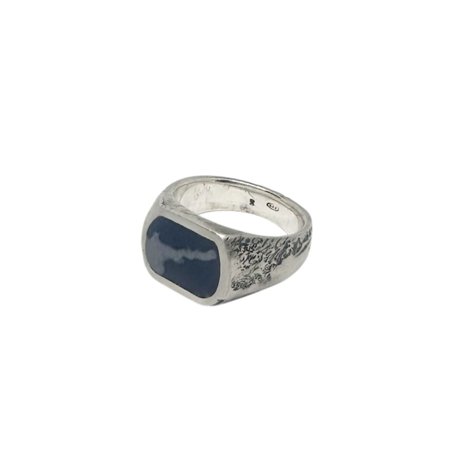 Black Trace Signet Ring detail — sand-cast surface texture and TG maker's mark, handcrafted in Cornwall