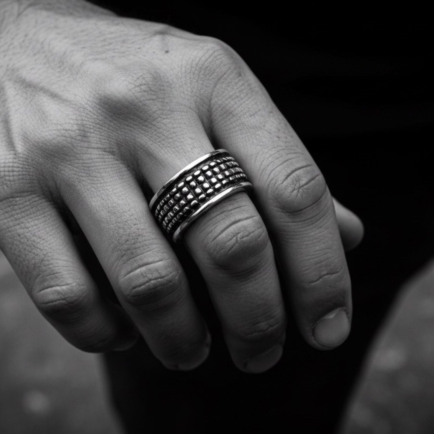Model wearing sterling silver 925 crocodile ring with oxidised finish, bold sculptural presence on hand