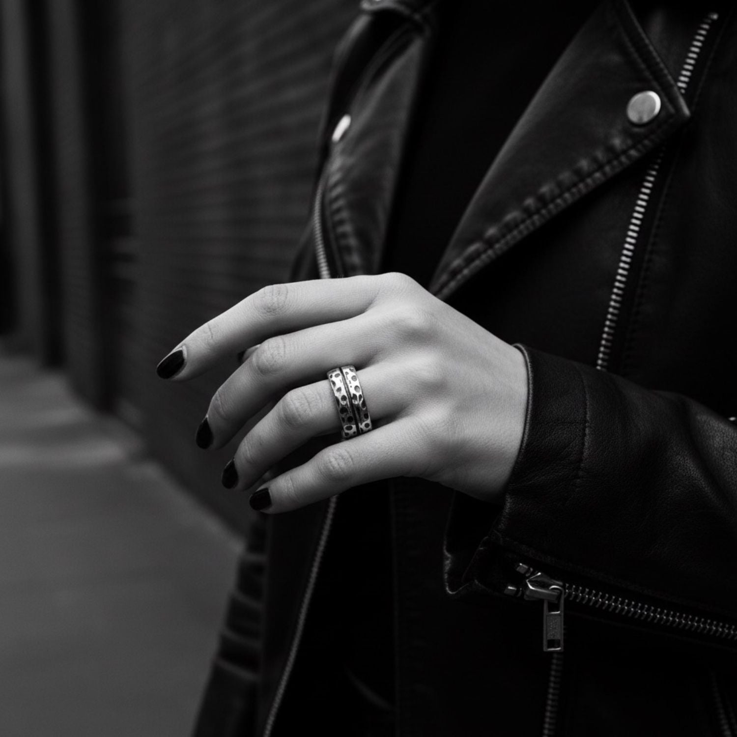 Model wearing sterling silver 925 Effect Ring on dark background, showing textured chunky band presence
