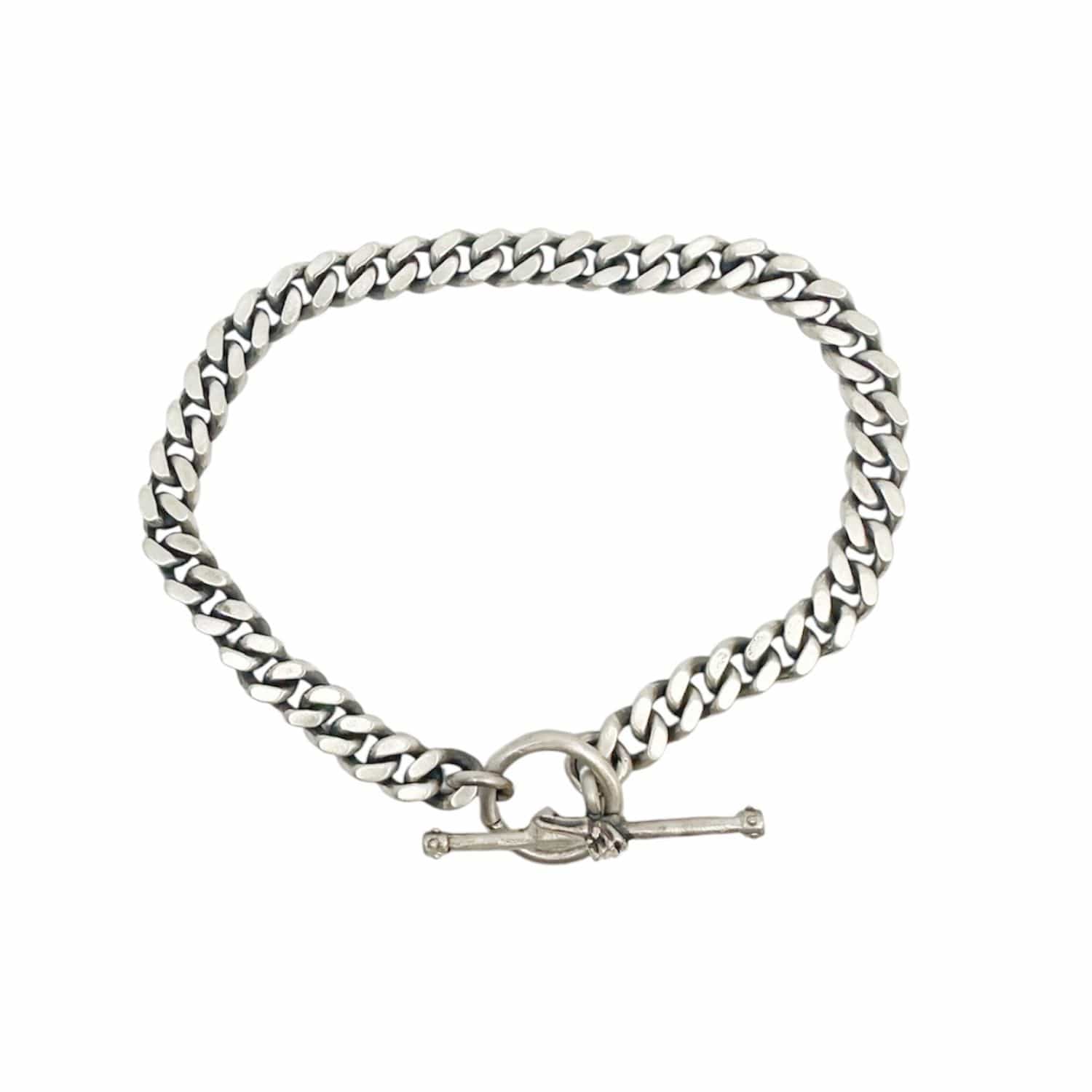 Sterling silver skull hand T-bar bracelet — handmade lost wax cast, oxidised flat curb chain, 20.5cm