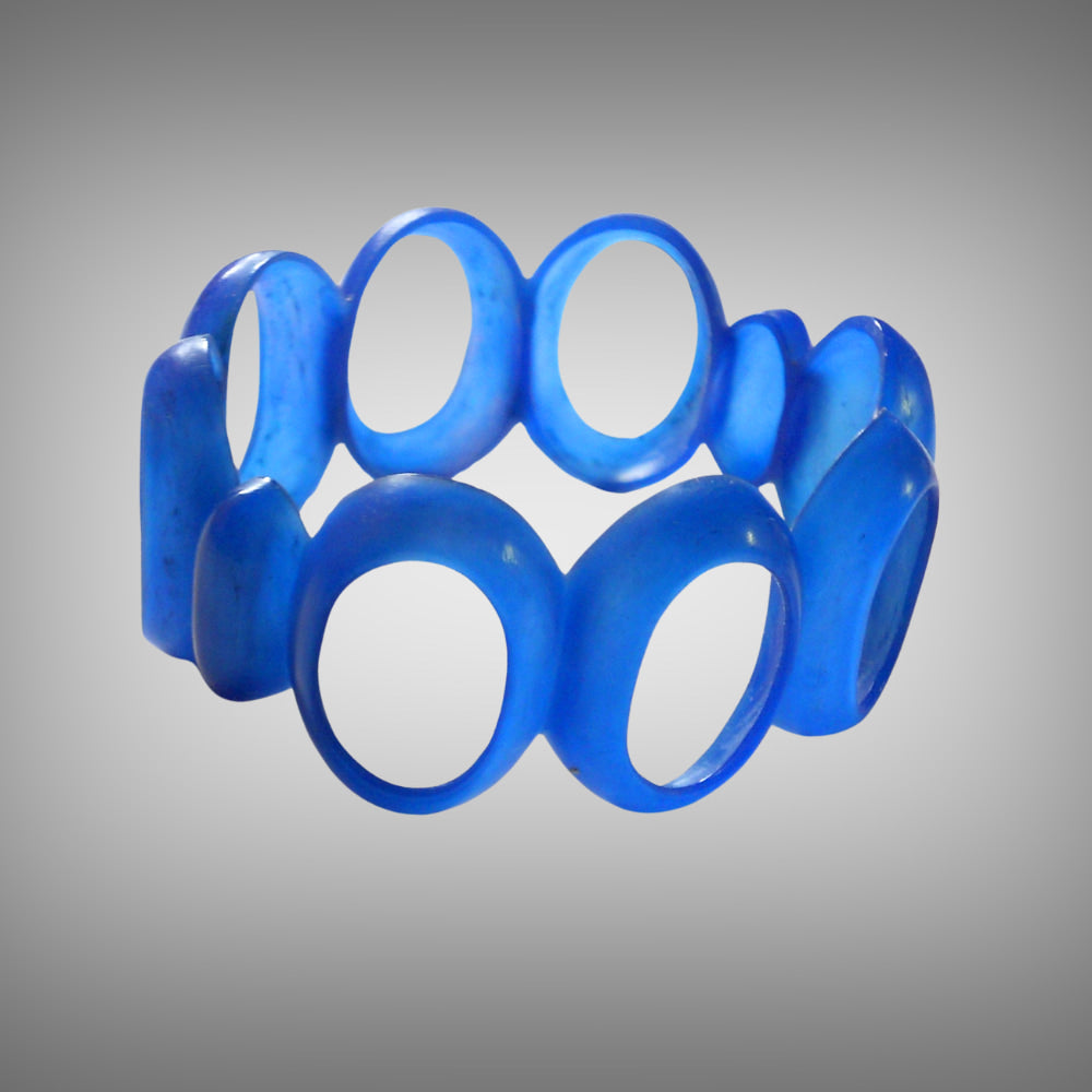 Blue wax carved oval link bangle prototype — example of sculptural jewellery made in lost wax carving workshop Cornwall by Tamara Gervasio