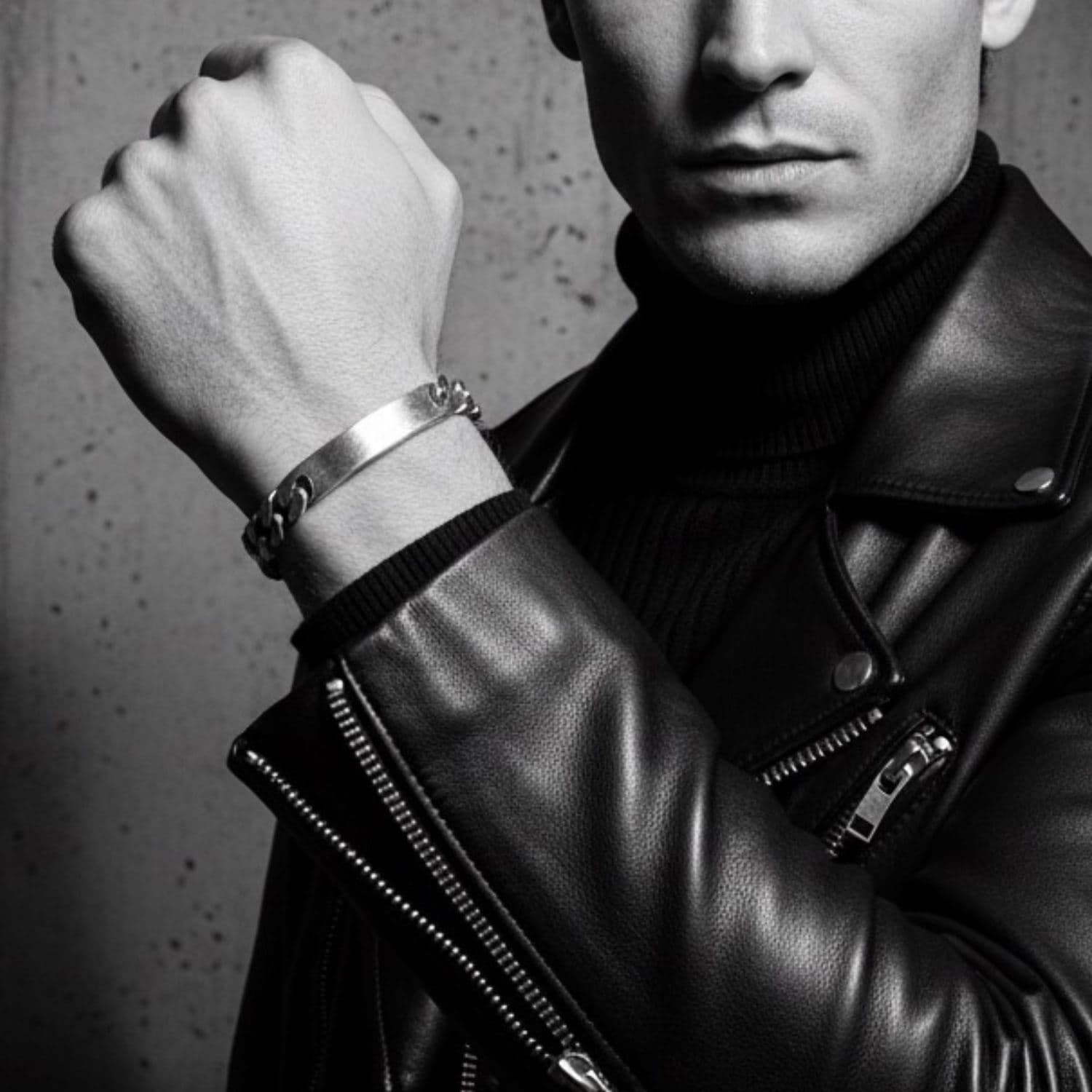 Men's recycled sterling silver ID bracelet worn on wrist, 21cm curb chain with ID plate, by Tamara Gervasio