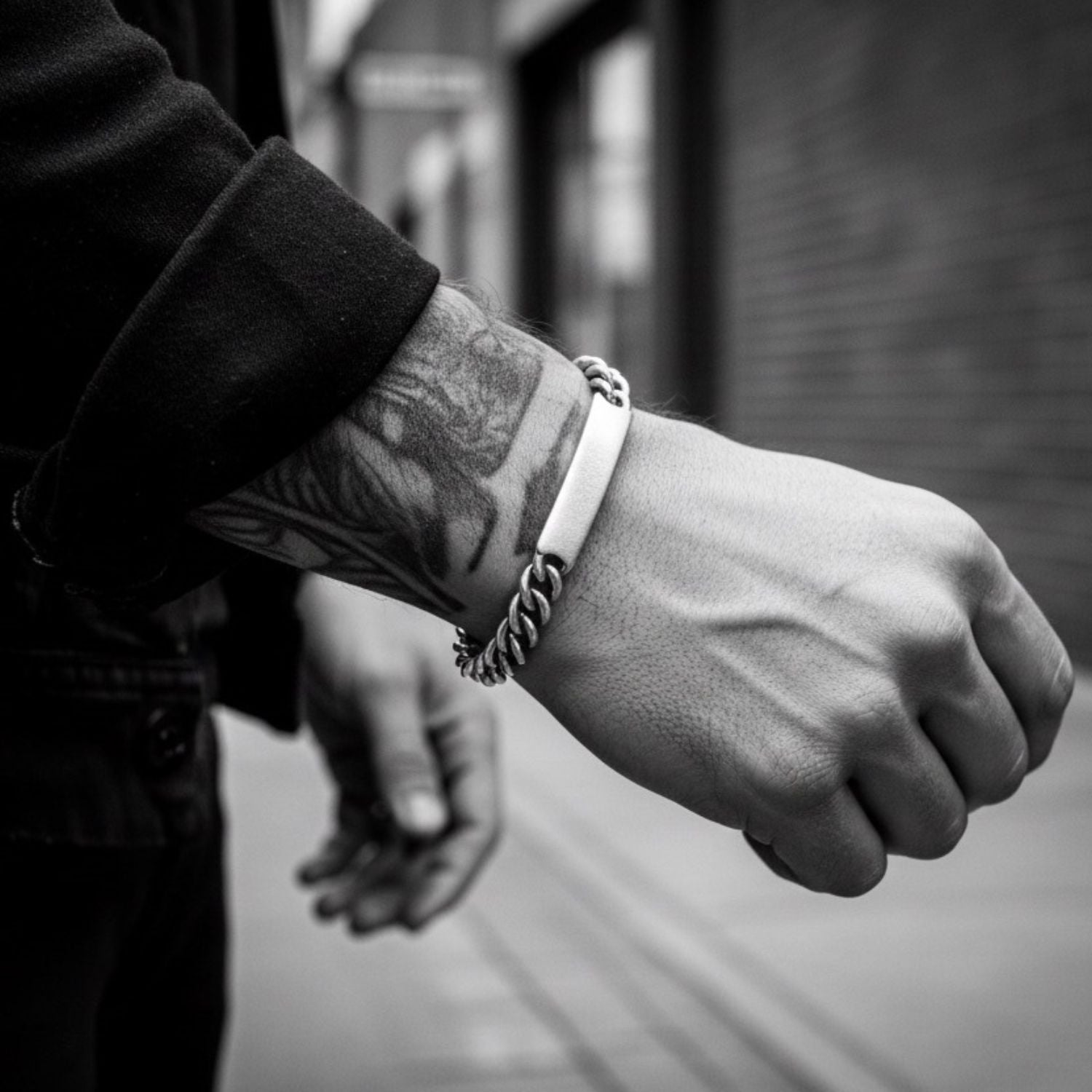 Men's handmade silver ID bracelet worn on wrist — TG-Jewellery