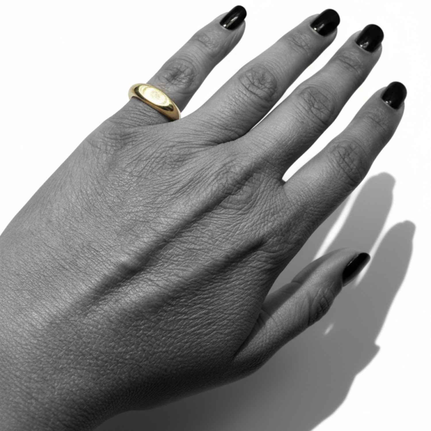 Molten Flow ring worn on hand, 18ct gold flash-plated sterling silver, sand-cast organic form