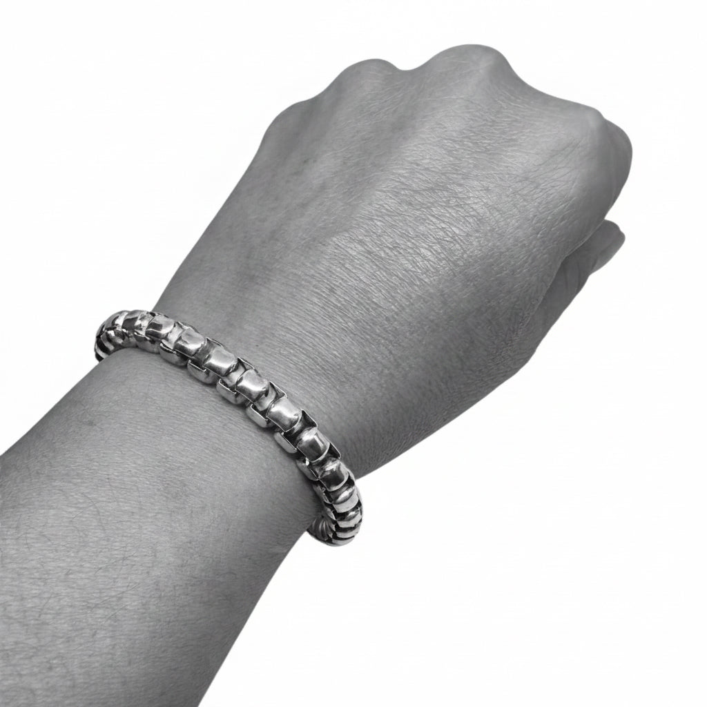 Men's sterling silver box chain bracelet flat lay – minimal sculptural design, UK hallmarked, 55.5g
