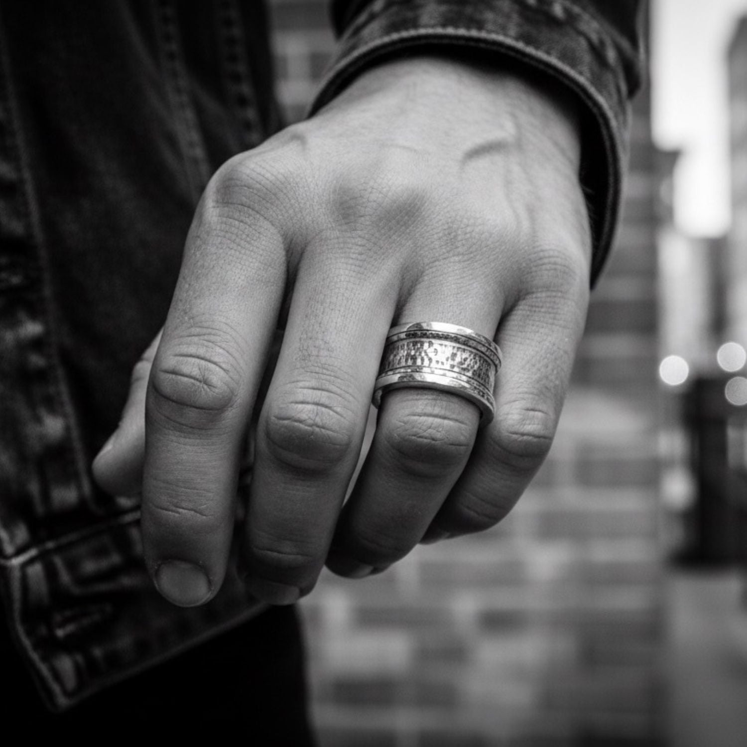 Model wearing sterling silver 925 Street Ring with oxidised finish, showing bold wide band presence on hand