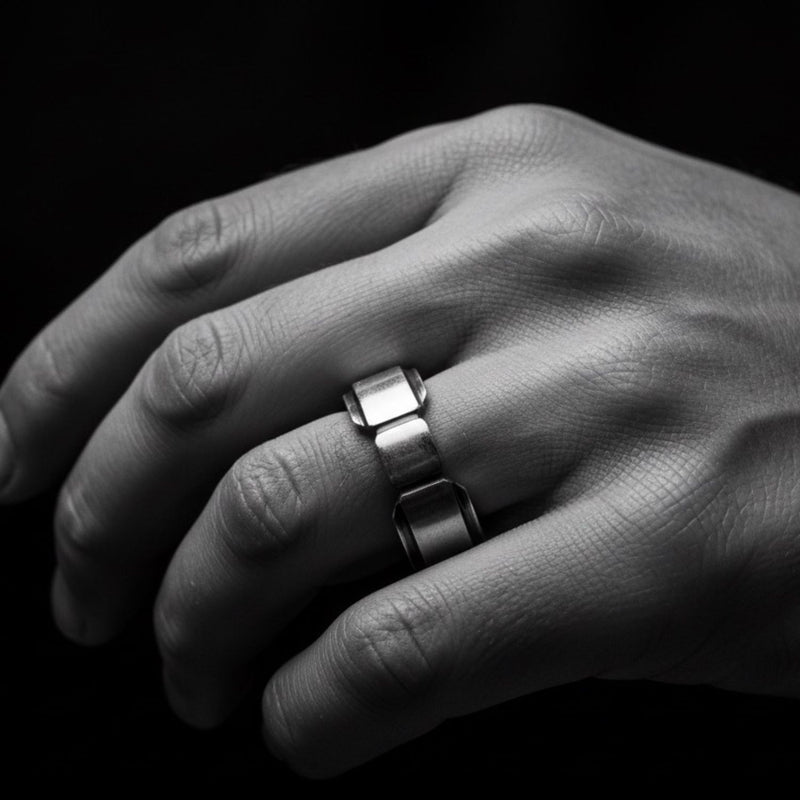 Geometric sterling silver statement ring worn on hand, bold architectural design with polished and darkened recesses — Tg-Jewellery

