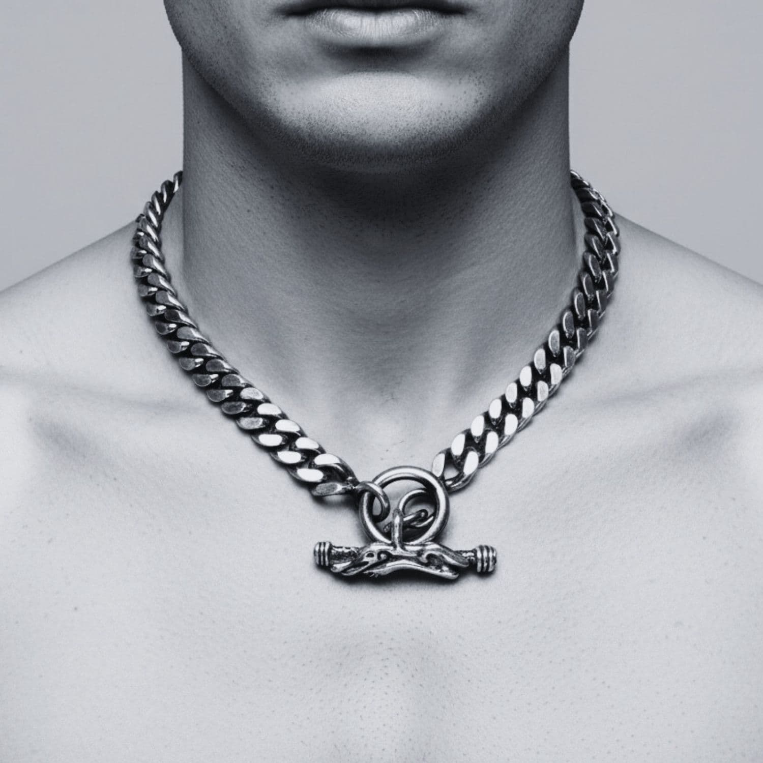 Heavyweight men's sterling silver curb chain necklace with Celtic crocodile T-bar clasp worn, 47cm length, Tg-Jewellery Cornwall