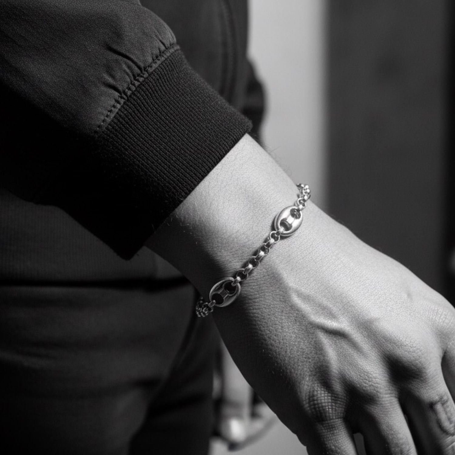 Model wearing sterling silver 925 Unisex Anchor Chain T-Bar Bracelet, architectural link sequence and bold presence on wrist