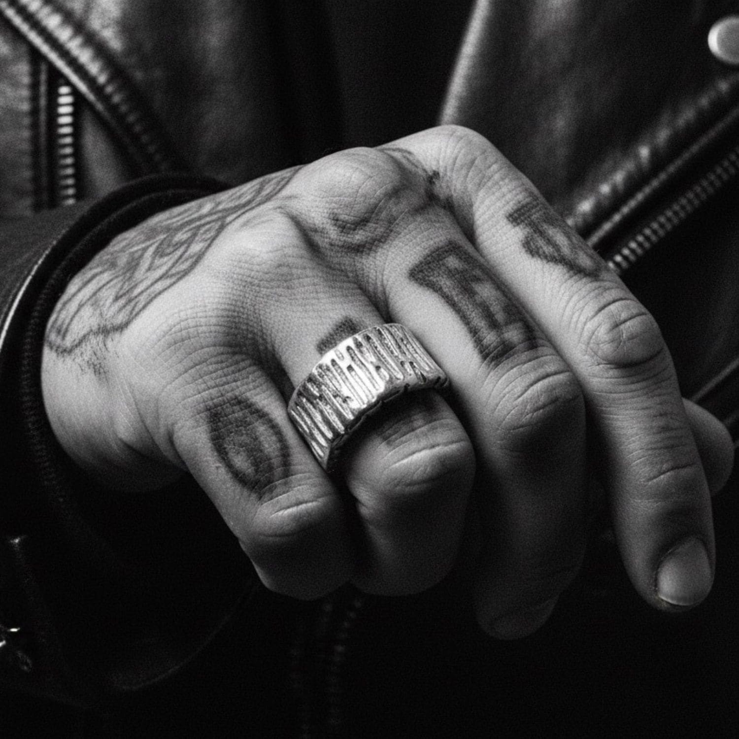 Model wearing sterling silver 925 Wheel Flat Band Ring in polished finish, clean reflective surface on hand