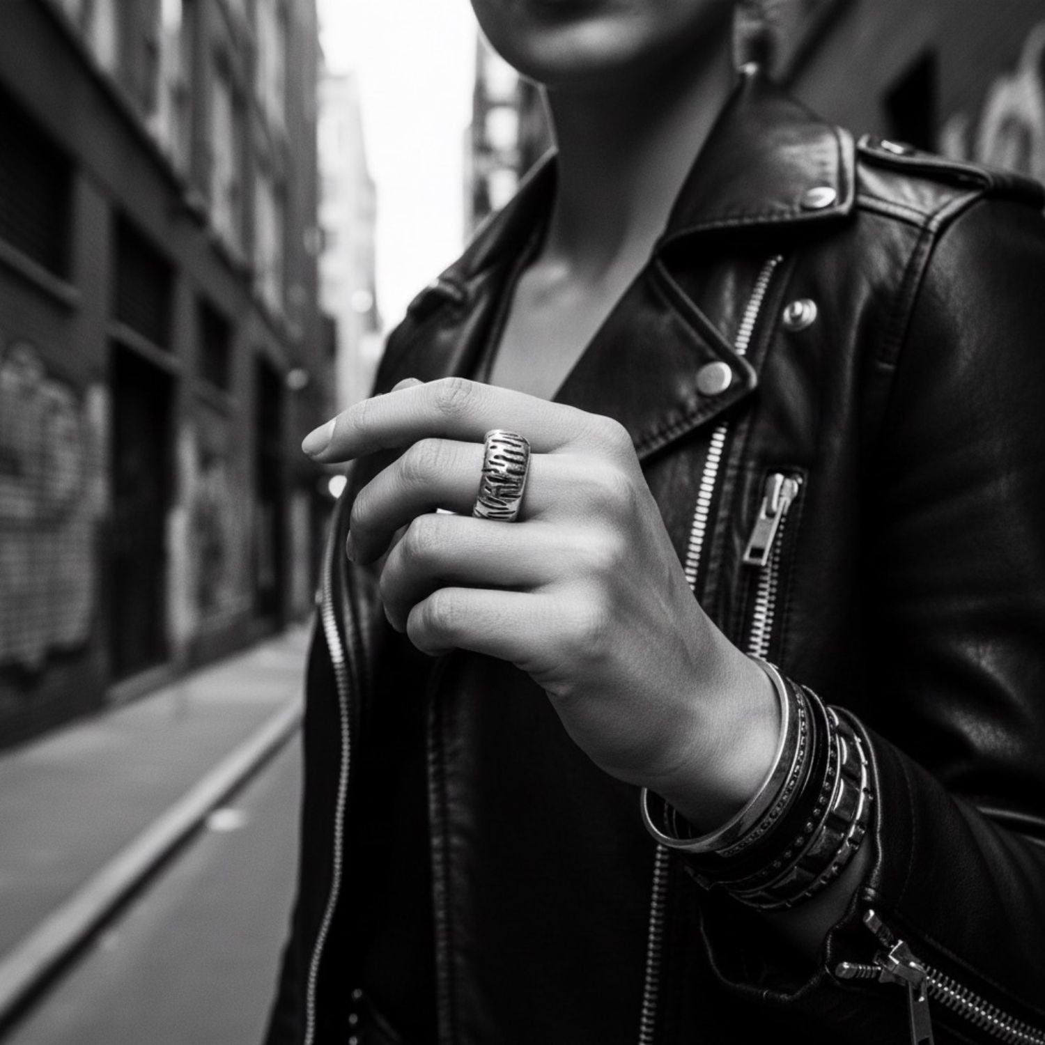 Model wearing sterling silver 925 Wheel Ring, showing bold sculptural wheel-inspired presence on hand